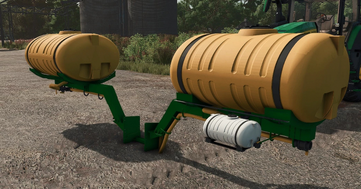 fs25-mods,  FS25 saddle tanks mod v1.0.0.0 in Farming Simulator 25, featuring two yellow tanks attached to green frames.