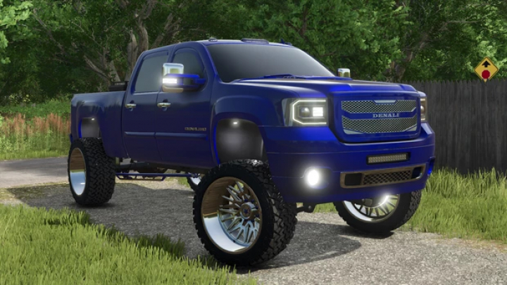 fs25-mods,  MCLAIN MODDING GMC 2500 in FS25, a blue pickup mod featuring lifted suspension and detailed wheels, showcased on a farm road.