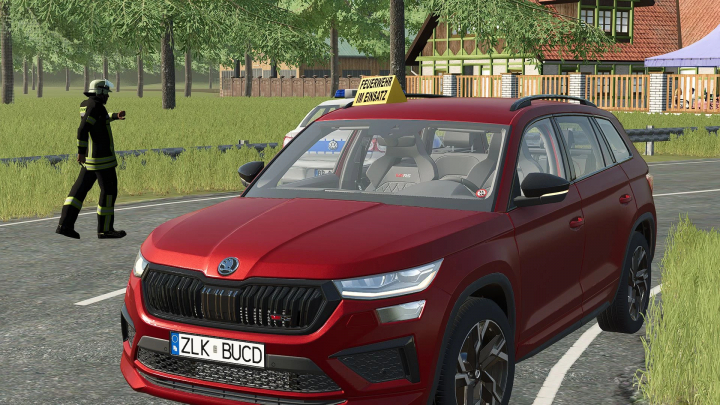 fs25-mods,  FS25 mod Skoda Kodiaq fire department v1.0.0.0 with a firefighter in the background.