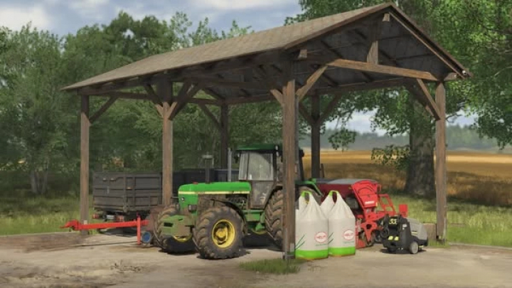 fs25-mods, FS25 mod small shelter with tractor and equipment stored under it, showcasing Farming Simulator 25 mods.