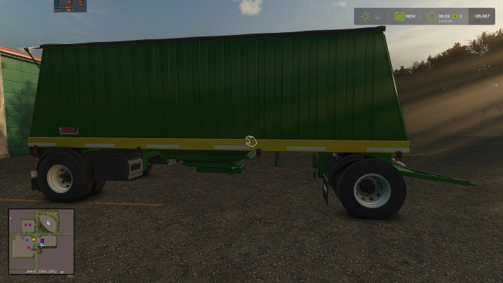 fs25-mods,  FS25 Trailers Ombu v1.0.0.0 mod showcasing a green and yellow trailer in Farming Simulator 25.