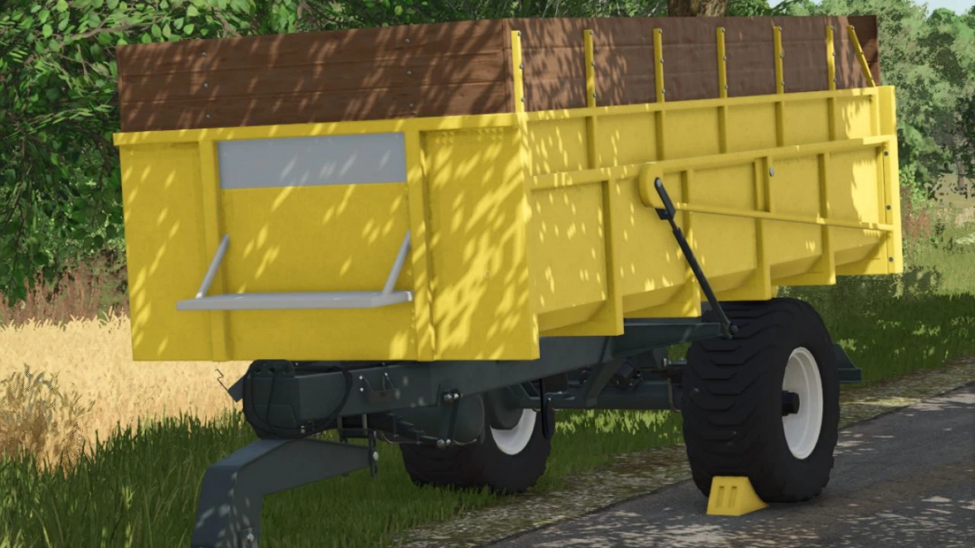 FS25 mod 30 Ton Trailer v1.0.0.0, a yellow and brown trailer in Farming Simulator 25.