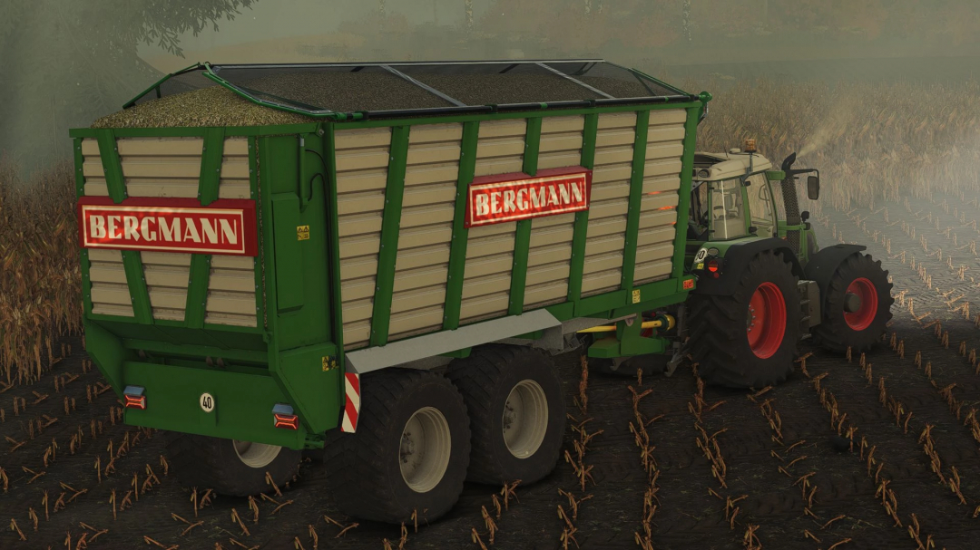 Bergmann HTW40 v1.0.0.0 mod in FS25, showcasing a green trailer on farmland.