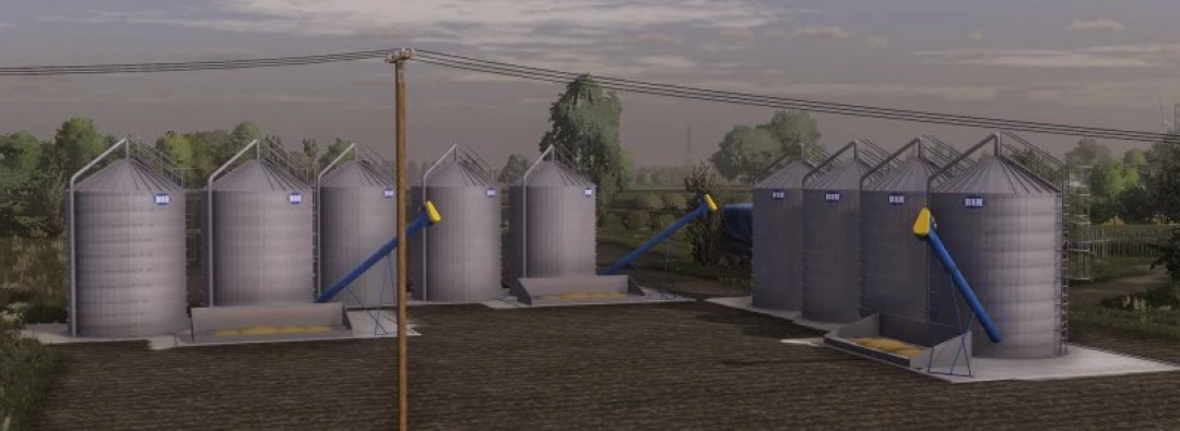 Bin Pack Zdziechów v1.0.0.0 in FS22, showing multiple grain silos on a farm. Farming Simulator 22 mods enhance game realism.