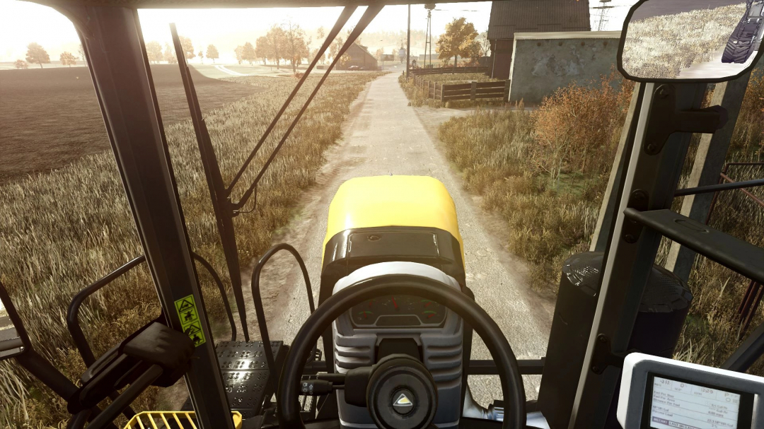 Challenger MT700 cockpit view in FS25 mod, showcasing rural road scene. FS25 mods enhance Farming Simulator 25 experience.