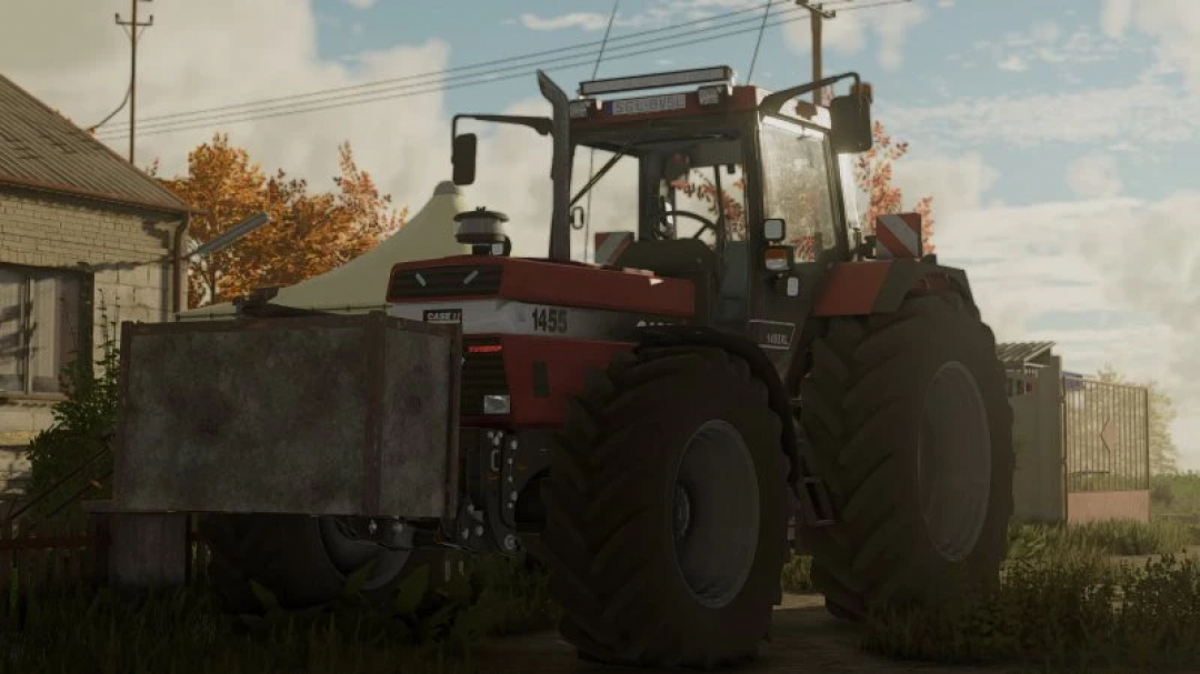 FS25 CaseIH 1455XL tractor mod in Farming Simulator 25, parked near a house on a sunny day.