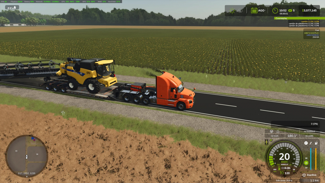 FS25 H550 Beavertail mod transporting combine harvester on highway in Farming Simulator 25.