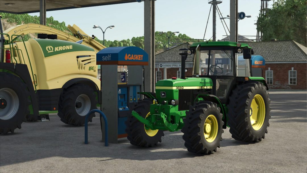 FS25 Realistic Refueling mod showing tractor at gas station with Krone harvester, Farming Simulator 25.