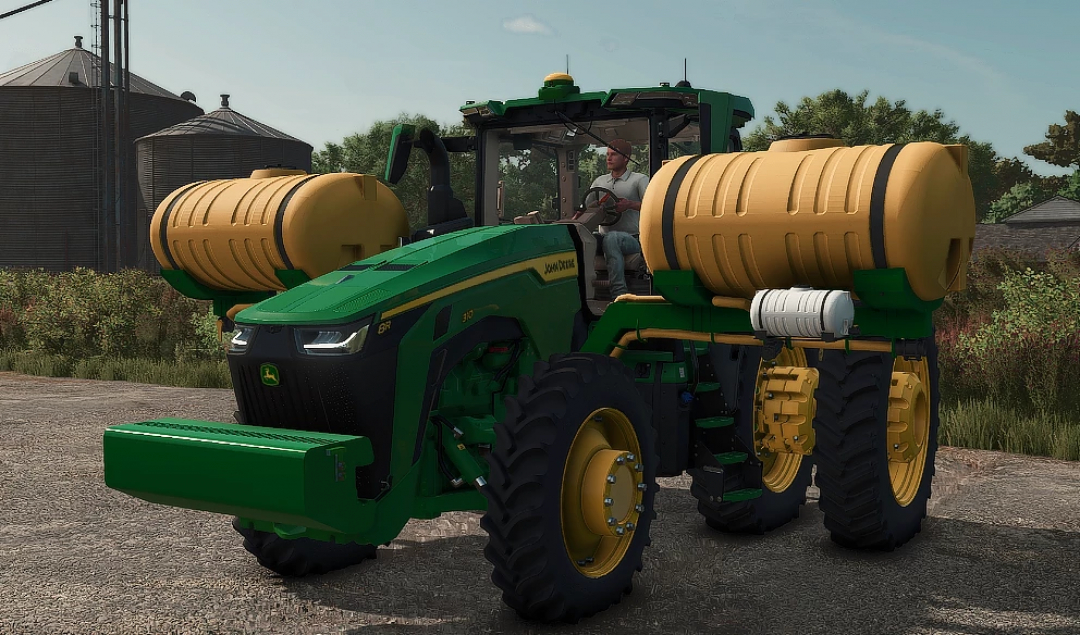 FS25 mod image showing a green tractor with saddle tanks, used in Farming Simulator 25 mods.