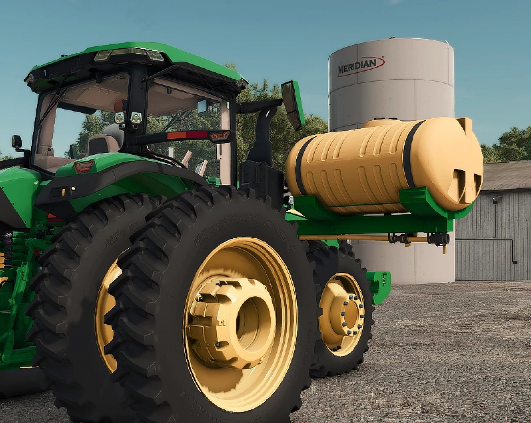 FS25 mods: Saddle tanks v1.0.0.0 on a tractor in Farming Simulator 25.