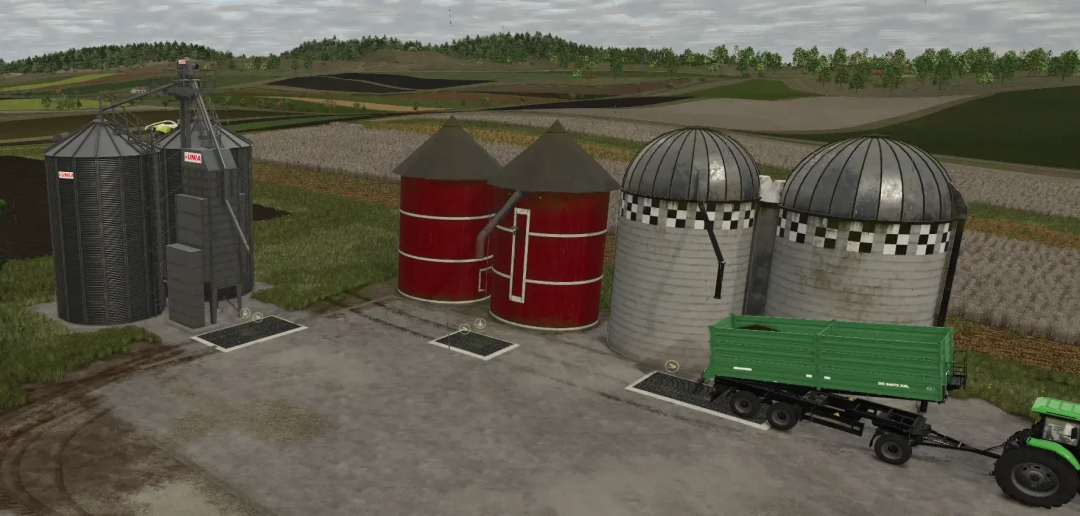 FS25 mods image showing Fermenting Silo v1.0.0.0 in Farming Simulator 25, with multiple silos and tractor in a rural landscape.