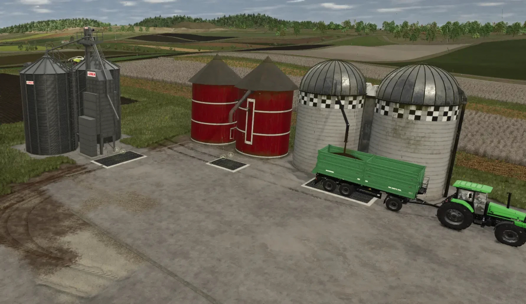 FS25 mod Fermenting Silo v1.0.0.0 image showing multiple silos with a tractor and trailer for Farming Simulator 25.