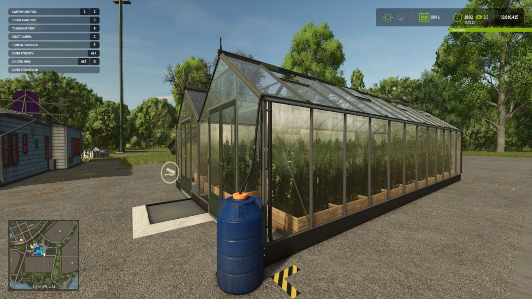 FS25 Hemp Production System mod showing a large greenhouse and water tank.