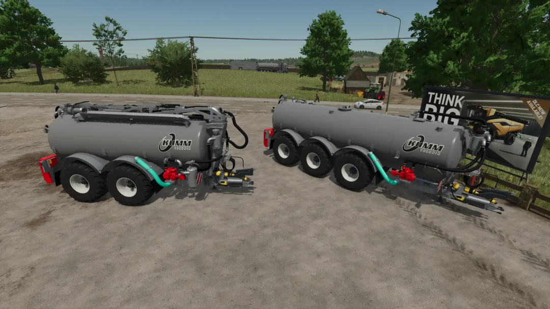 Kumm Technik Pack v1.0.0.0 mod for FS25 showing two large grey tankers on a farm.