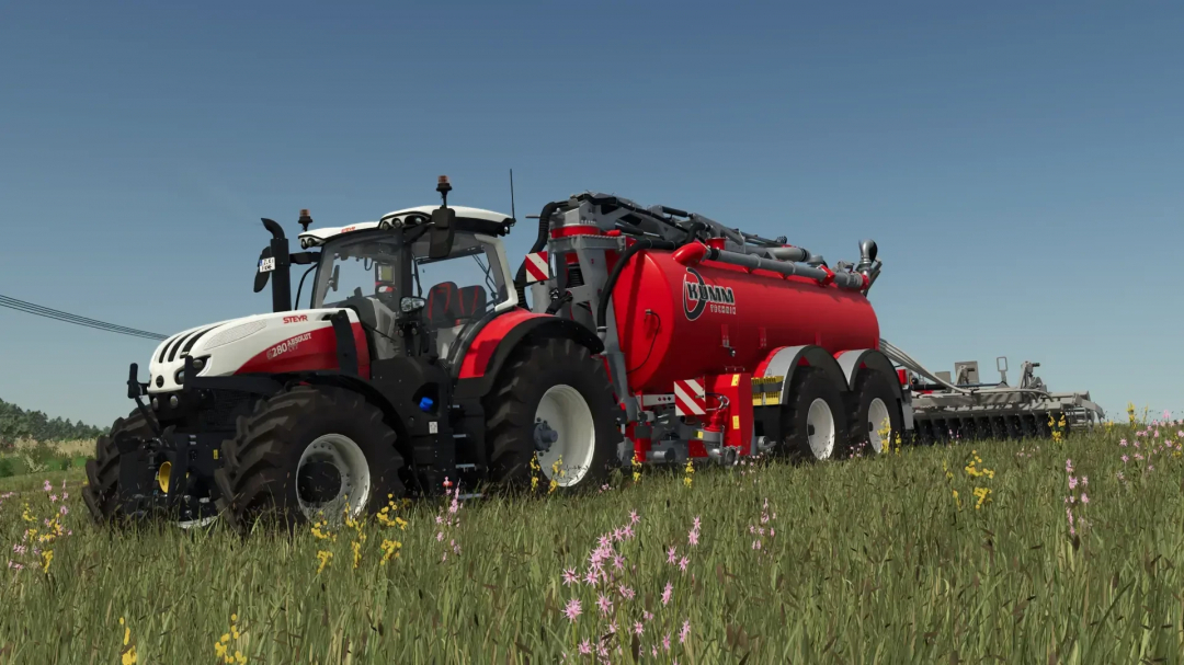 FS25 mod Kumm Technik Pack v1.0.0.0 featuring a red tractor with slurry tank in a field.