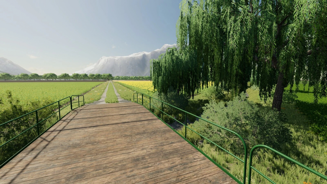 Scenic view of a bridge and fields with mountains in Lexington Map mod for FS22.