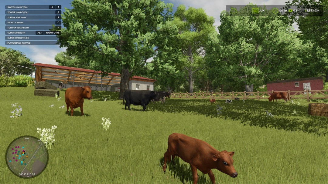 FS25 mod Medium Cow Barn Wooden Fence with increased storage, featuring cows grazing in a grassy pasture, surrounded by trees and a barn.