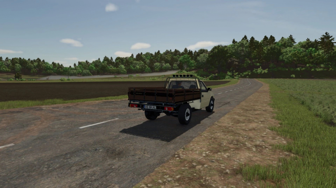 Opel Campo mod in Farming Simulator 25 driving on a rural road, featuring lush green landscape.