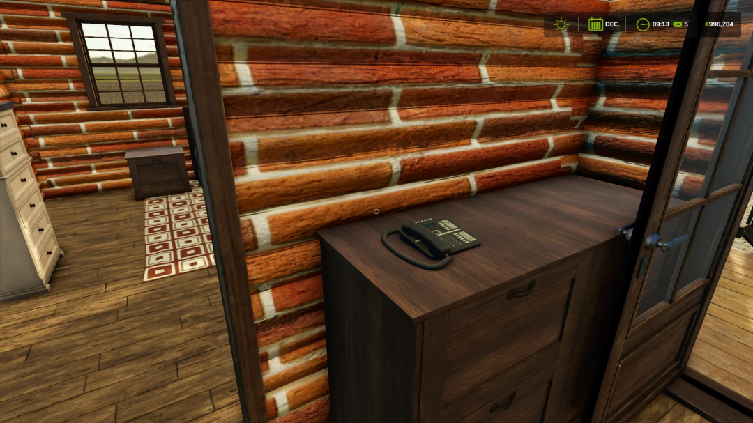 Interior of a red brick house mod in FS25, featuring wooden furniture and a phone on a dresser.