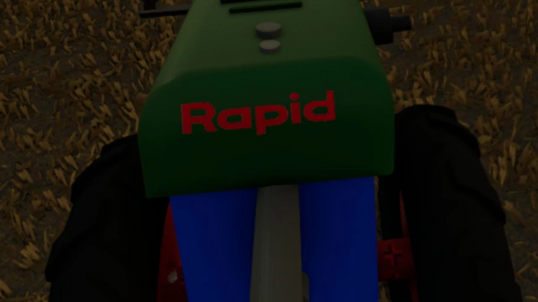 Close-up of Rapid Special mod for FS25, showing green and blue components on farmland.