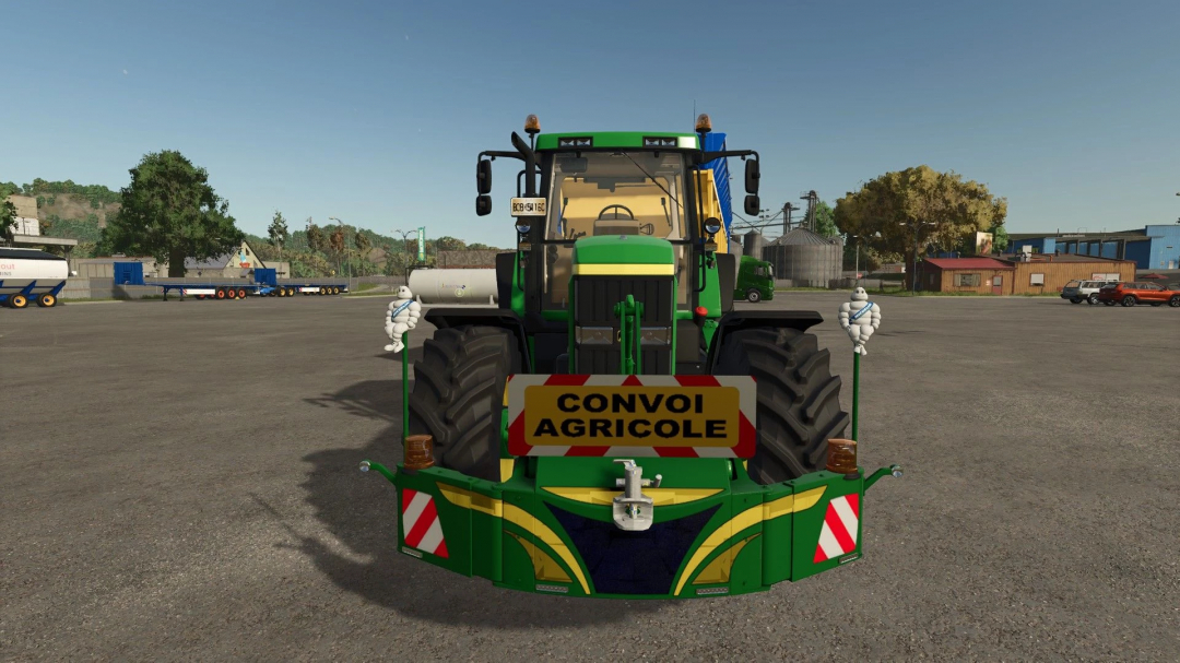 FS25 mod image showing a green tractor with safety weights pack v1.0.0.0, featuring a 'Convoi Agricole' sign in Farming Simulator 25.