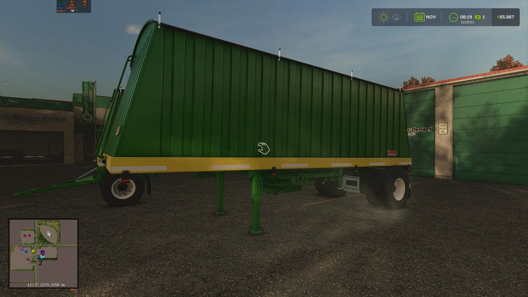 Green Ombu trailer mod in Farming Simulator 25 at a tractor center.