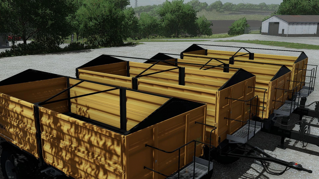 FS22 mods: Multiple yellow trailers from the Wielton Pack v1.1.0.0 in Farming Simulator 22 parked in a rural setting.