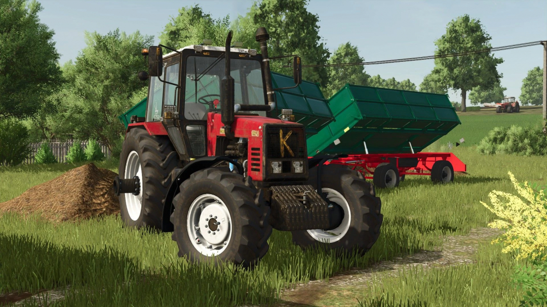 Zmaj 489 Farma kanas tractor mod in FS25 game showcasing a red tractor with a green trailer in a grassy field.