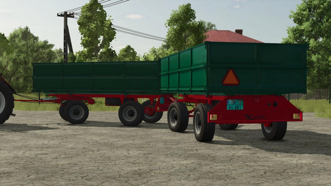 FS25 mod Zmaj 489 Farma kanas v1.2.0.0 showing agricultural trailers on a sunny day.