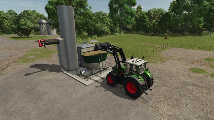 fs25-mods, FS25 mod image showcasing Feed Mixing Plants with a tractor loading feed, highlighting features of Farming Simulator 25 mods.