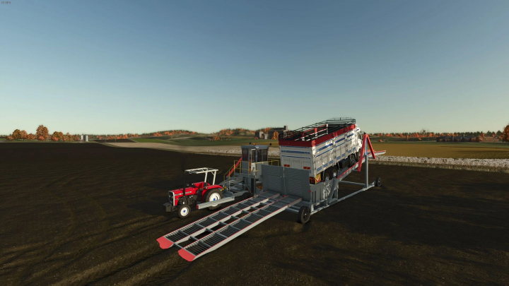 fs25-mods,  Kompleks 65M2B3-k mod in FS25 featuring a tractor attached to farming equipment in a field.