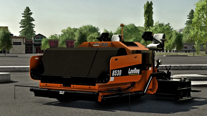 fs22-mods, FS22 mod Lee Boy 8530 paver parked in an urban area with buildings and trees in Farming Simulator 22.