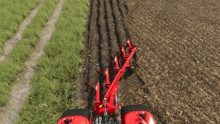 fs25-mods, ÜNLÜ 5 L? PULLUK mod in FS25 plowing a field with green crops on one side.