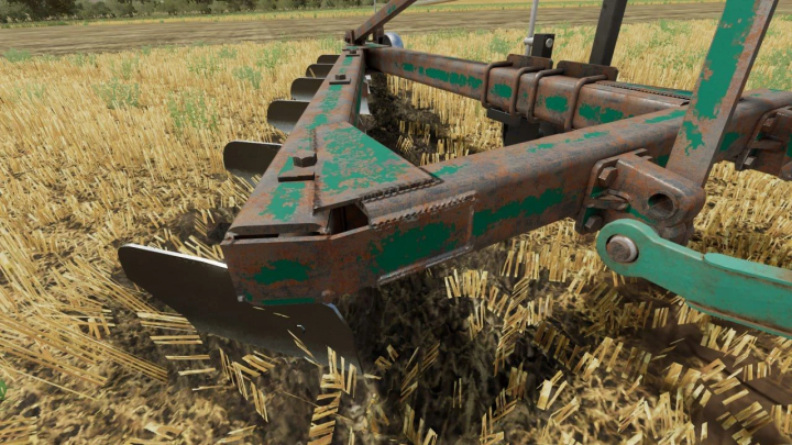 fs22-mods, Close-up of PLN 6-35 plow mod in FS22, showcasing rust details on a harvested field.