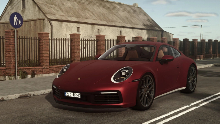 fs25-mods,  FS25 Porsche Carrera 4S mod v1.0.0.0 in a rural setting, enhancing gameplay realism.