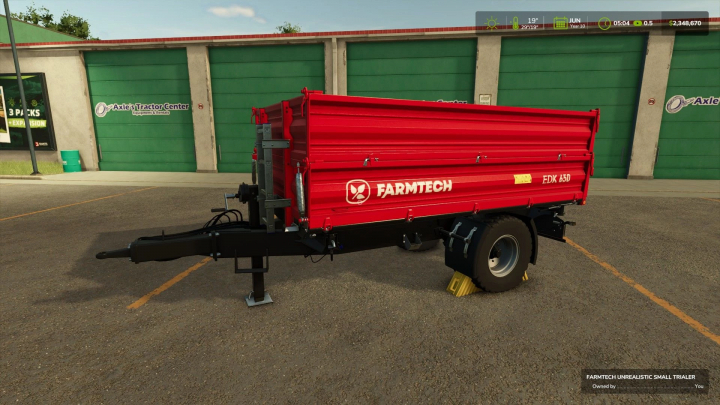 fs25-mods,  FS25 mod image showing Small Unrealistic Agricultural Trailer v1.0.0.0 with red Farmtech design.