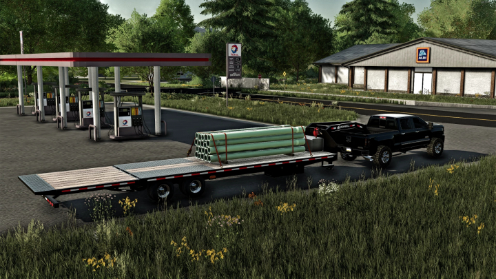 fs22-mods,  FS22 mod image showing TSC Iron Bull Trailer loaded with pipes at a gas station. Farming Simulator 22 mod scene.