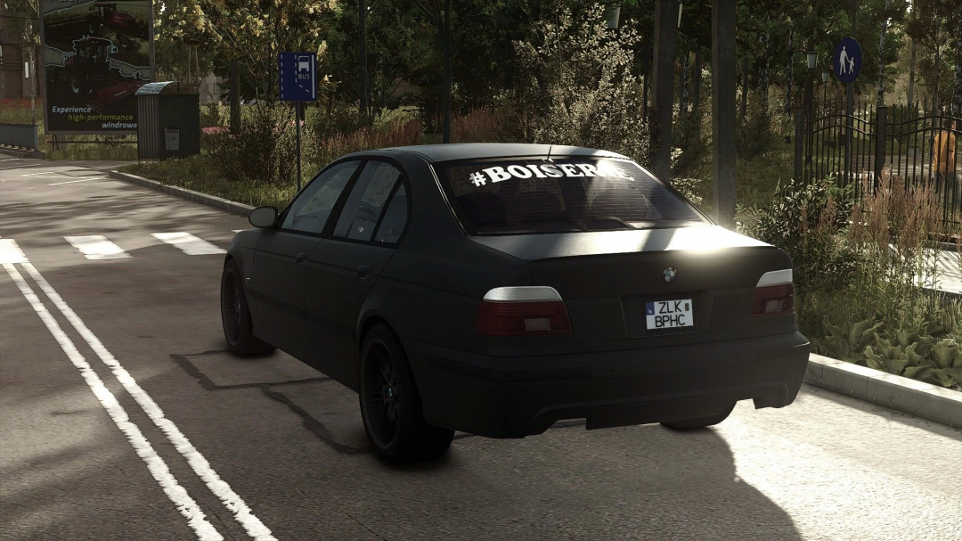 BMW E39 530D mod for FS25 showcased on a sunny street, highlighting realistic vehicle detail in Farming Simulator 25 mods.