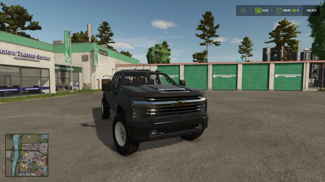 Chevrolet Silverado 2500 High Country mod in FS25 outside a tractor center.