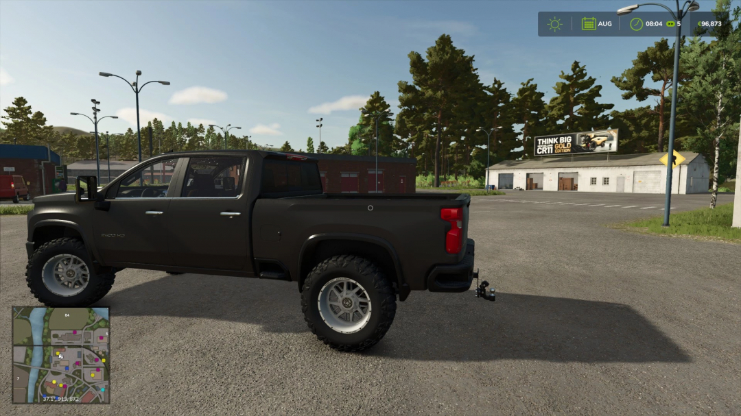 FS25 mod Chevrolet Silverado 2500 High Country in a parking lot, showcasing vehicle detail in Farming Simulator 25.