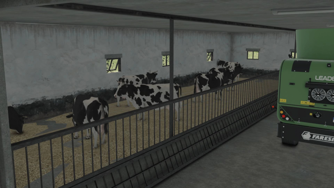 FS25 Cow Barn With Garages mod showcasing cows inside a barn with farming equipment.