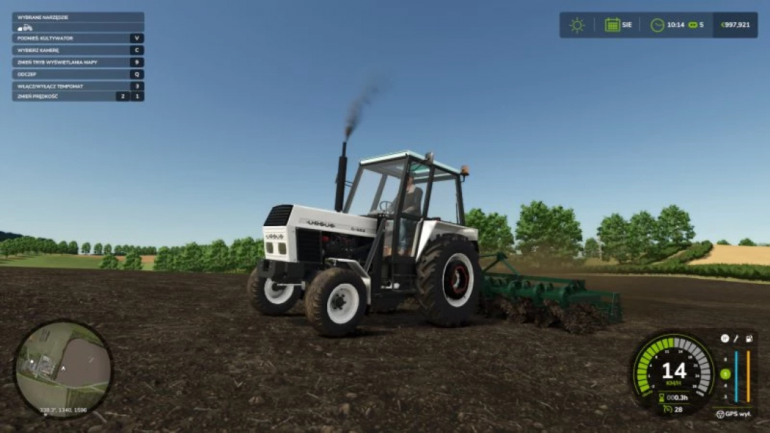 FS25 mods: A tractor using the Cultivator 4 meters v1.0.0.0 in Farming Simulator 25 plows a field.