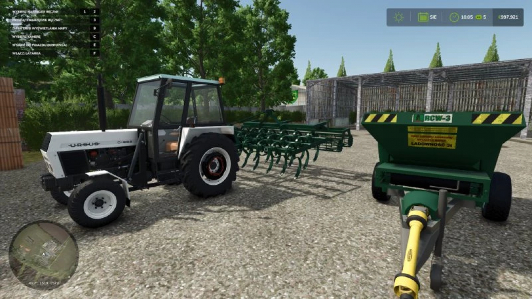 FS25 mods image showing a tractor with a 4-meter cultivator in a farm setting.