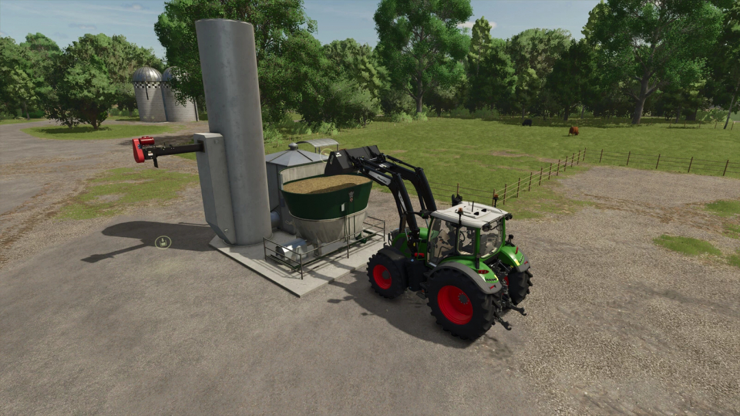 FS25 mod image showcasing Feed Mixing Plants with a tractor loading feed, highlighting features of Farming Simulator 25 mods.