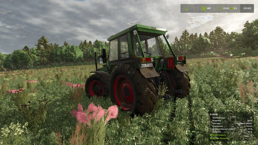 Fendt 600 LS tractor mod in FS25, displayed in a lush green field under a cloudy sky.