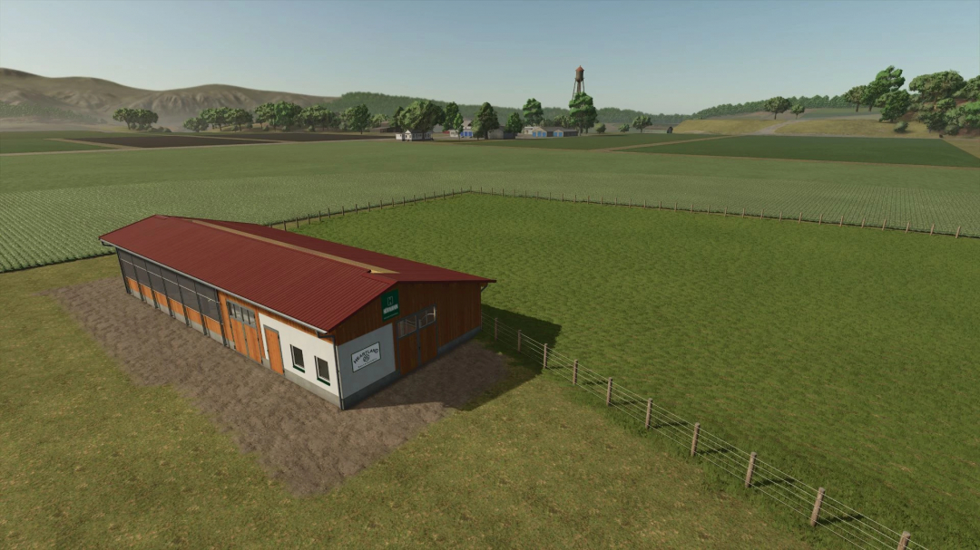 Barn with red roof in green fields in FS25 FunFarm ModPack.