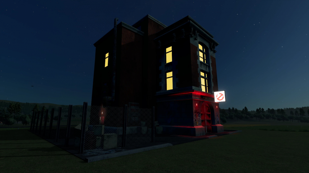 FS25 mod Ghostbusters Firehouse v1.0.0.0 at night with lit windows and Ghostbusters sign.