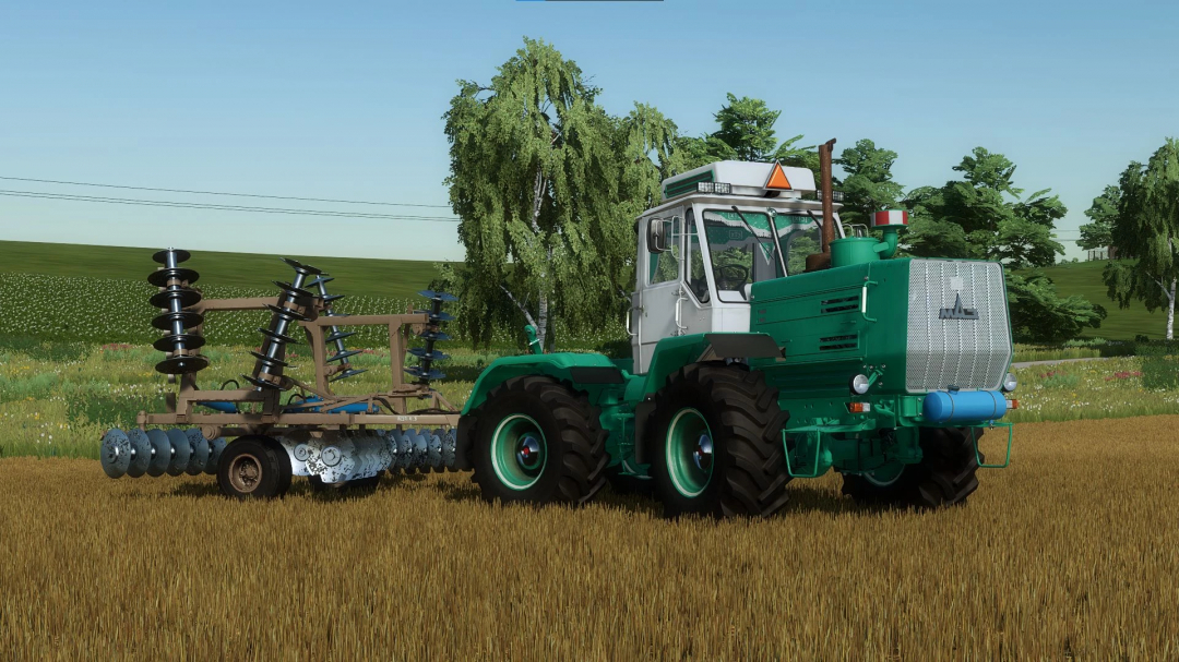 FS22 mod HTZ T-150K V8 v2.1.0.0 tractor in a field with equipment