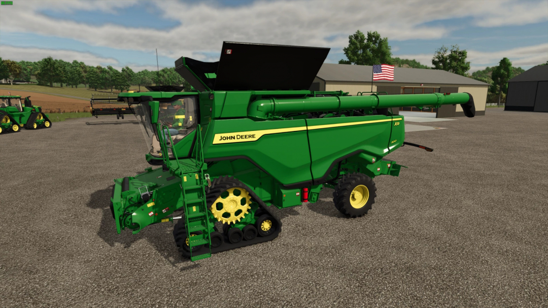 FS25 mod John Deere X9 1100 harvester parked on a farm.