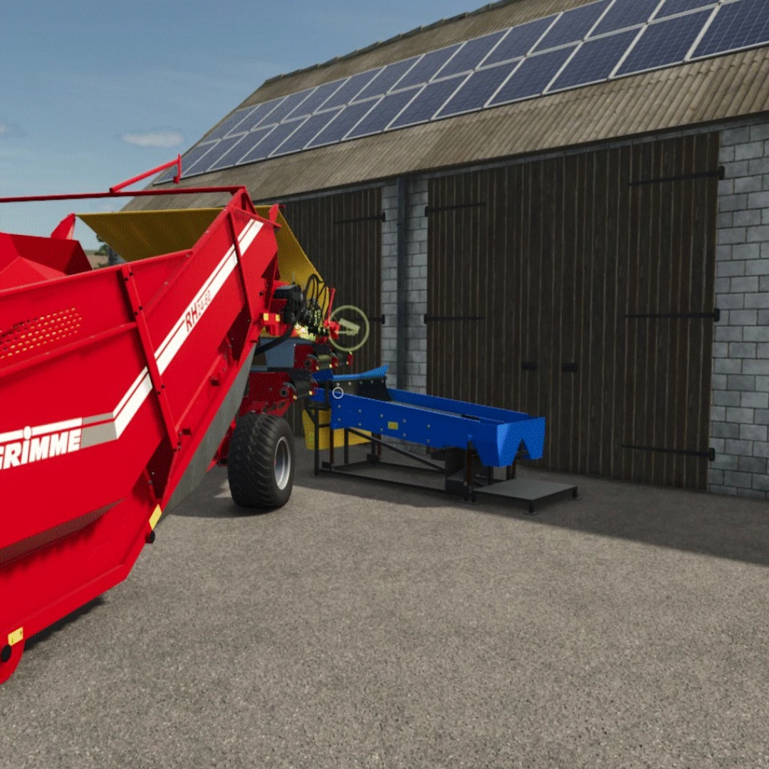 FS25 mod Kartoffel Sortierer v1.0.0.0 in action, featuring potato sorting equipment with a shed in the background.